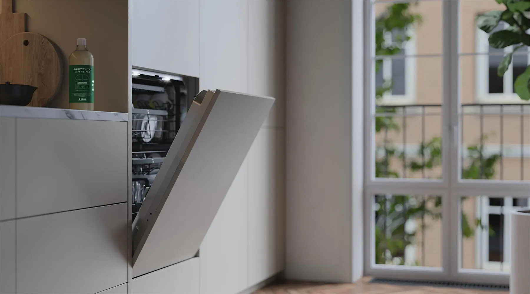 ASKO DW60 dishwasher installed in a modern kitchen
