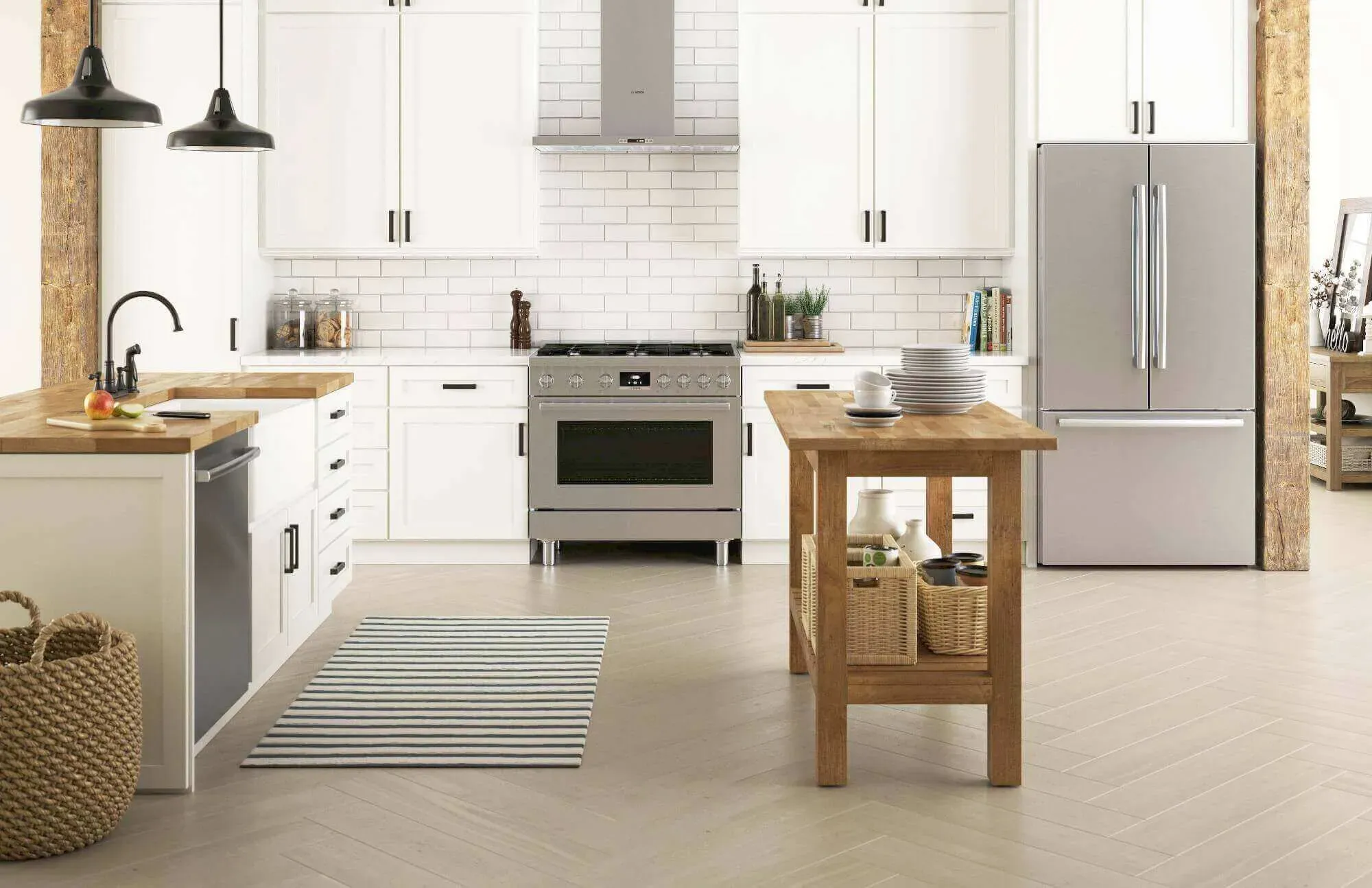 Light colored kitchen with stainless steel Bosch appliances