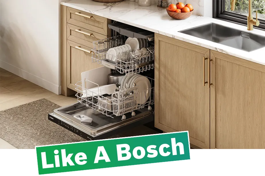 Like A Bosch. Open Bosch dishwasher loaded with dishes