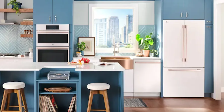 kitchen image with blue cabinets and bronze sink