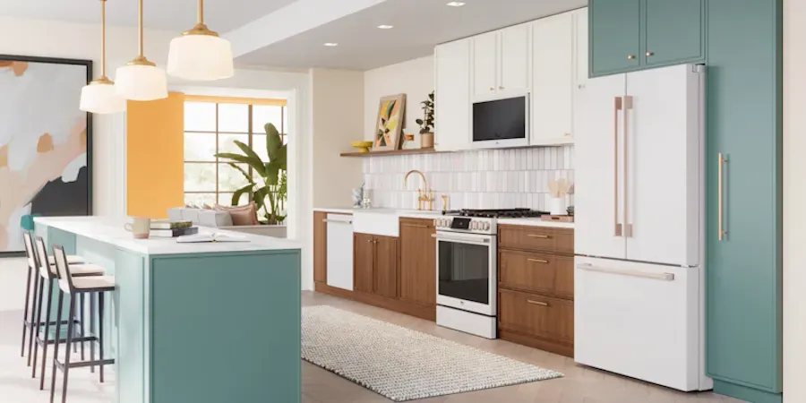kitchen image with green panels and natural wood drawers