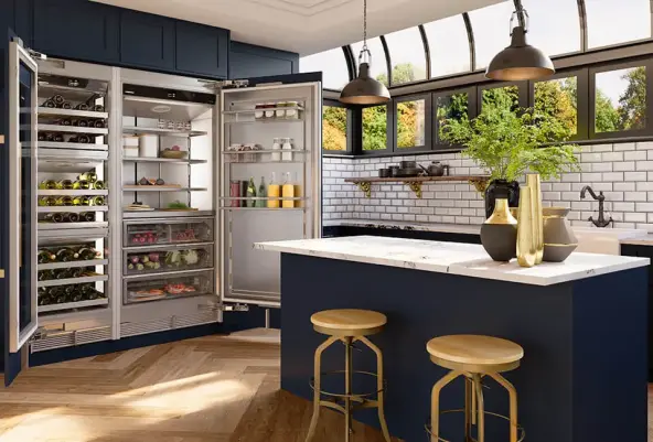 kitchen with dark blue accents featuring liebherr monolith refrigerator
