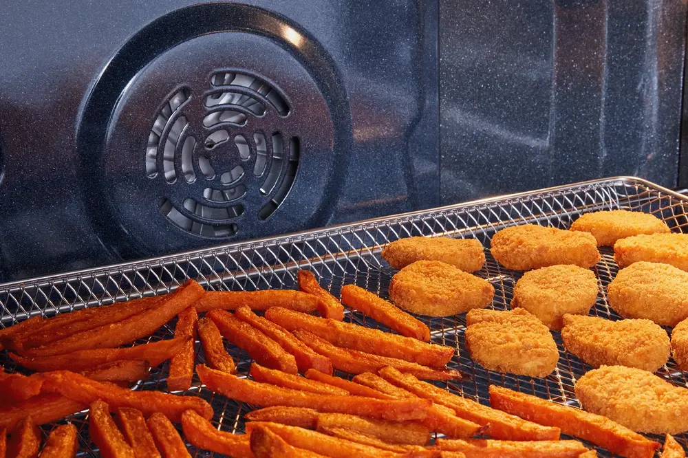 image of inside oven, showing food being baked