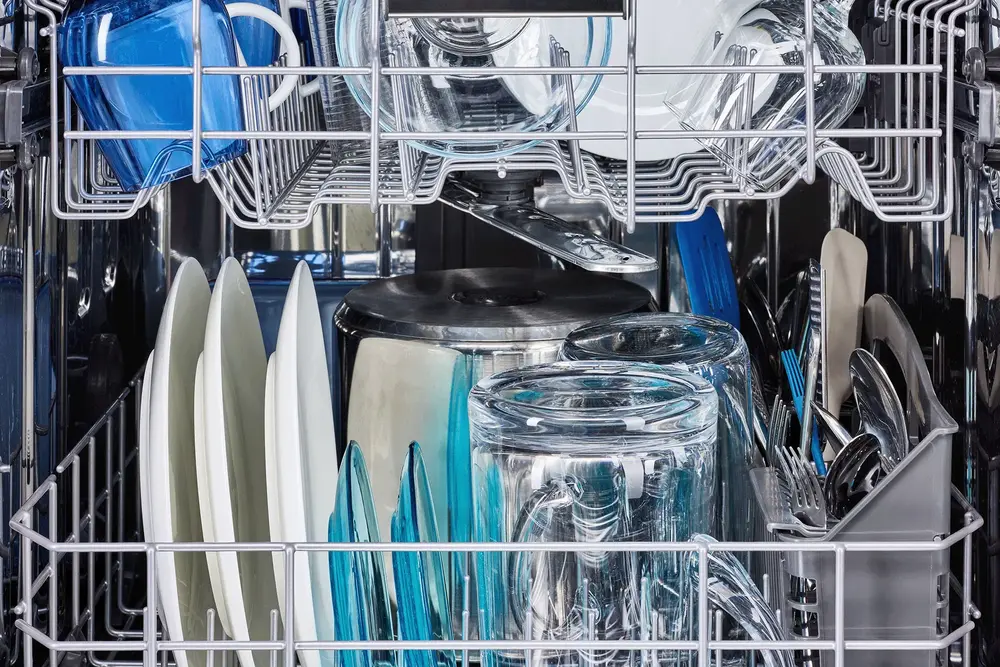 image of inside the dishwasher, showing capacity of dishes