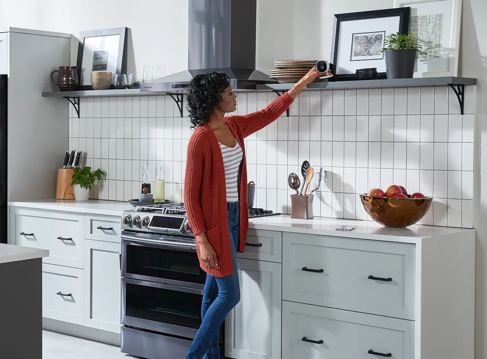 A kitchen with a Samsung range