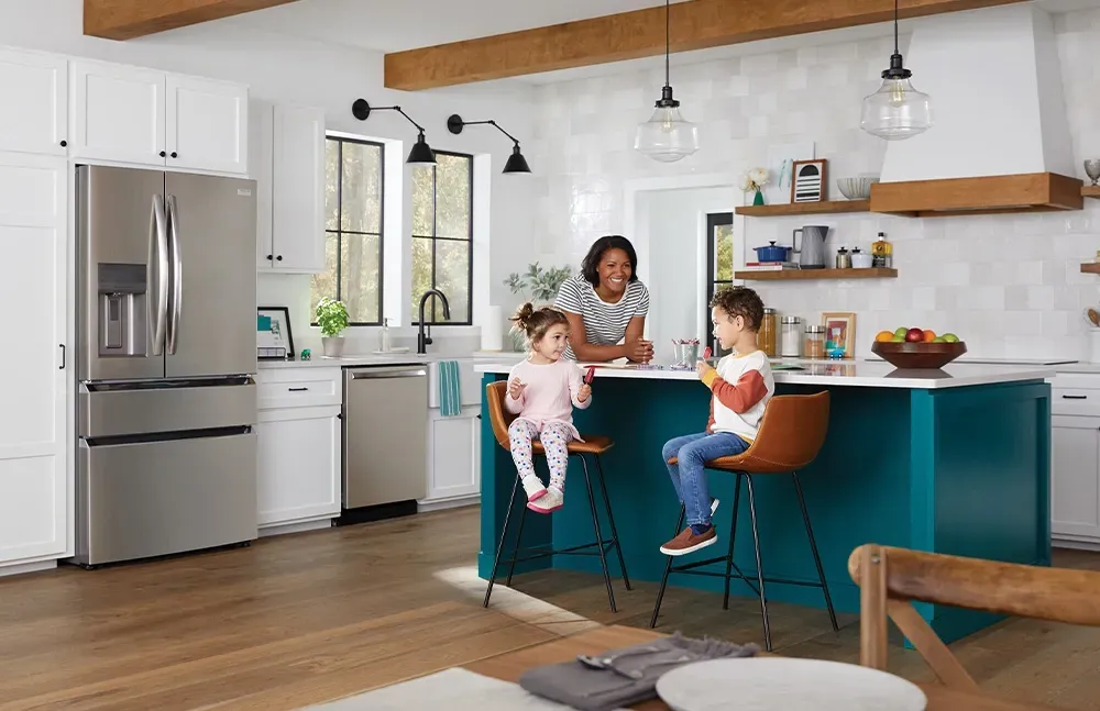 slide 1 lifestyle image, with woman and kids in kitchen