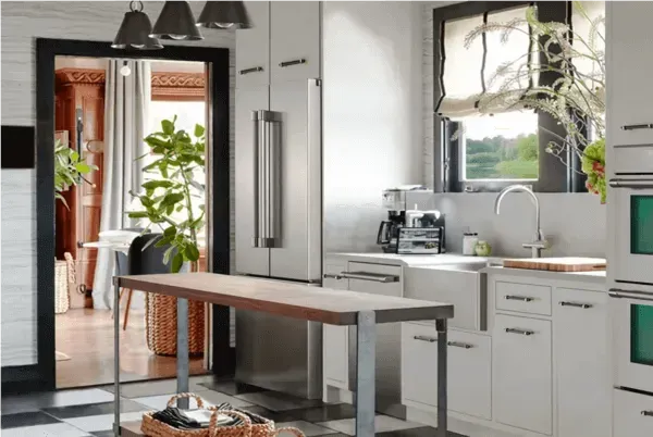 Light Blue Kitchen cabinets and seamless appliances 