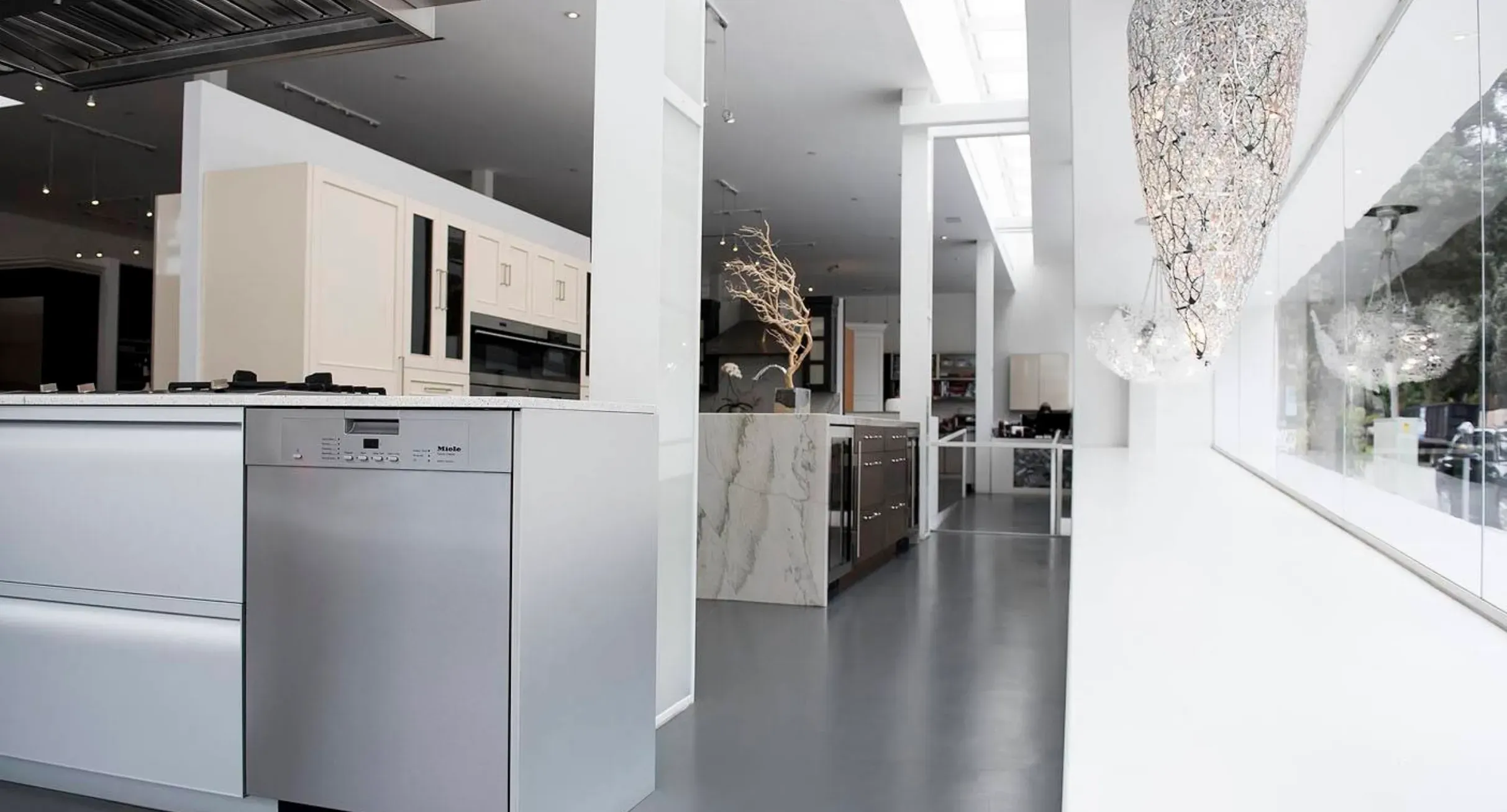 Waterfall marble island with Miele dishwasher