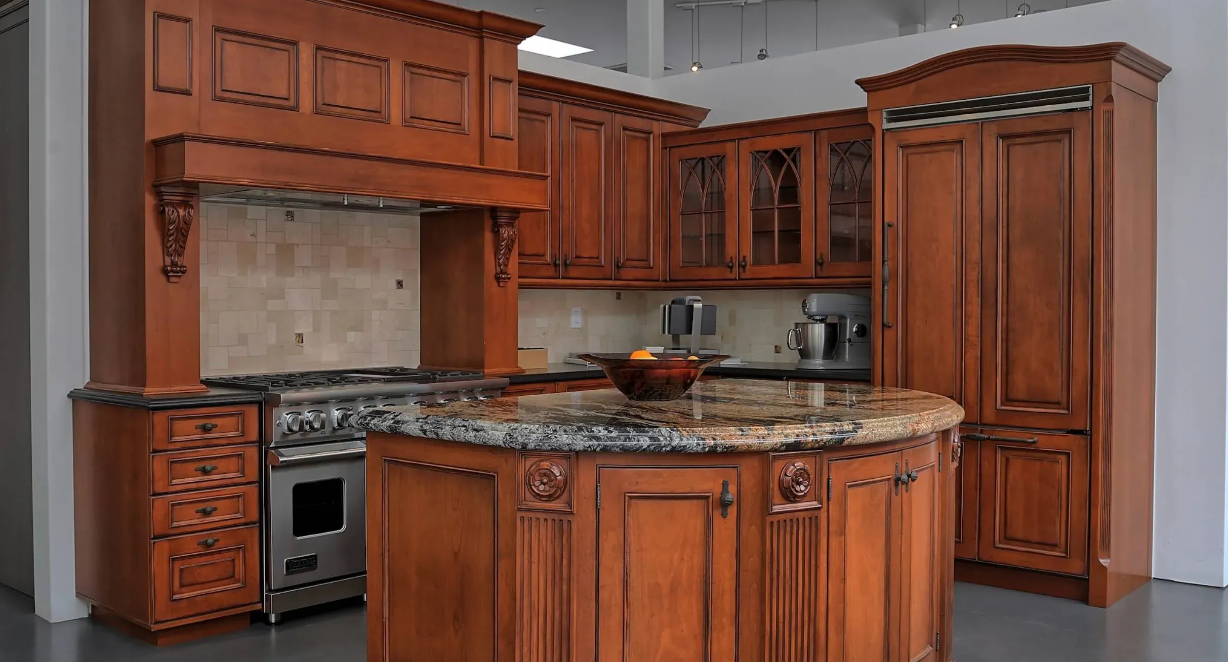Cherry raised-panel cabinetry and granite island