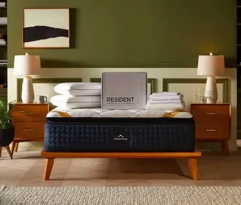 DreamCloud mattress with pillows and nightstands