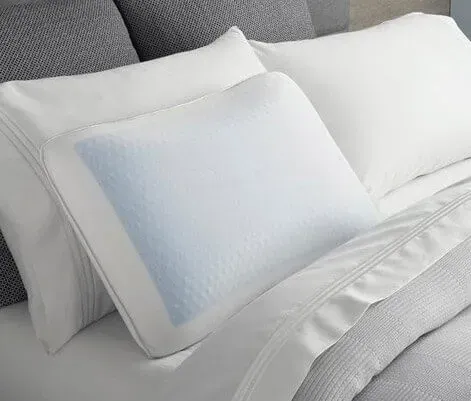 Close-up of pillows on a bed, representing the Pillows category