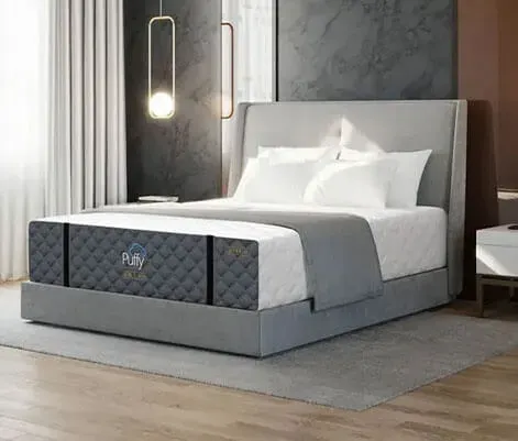 Puffy mattress on a modern bed frame