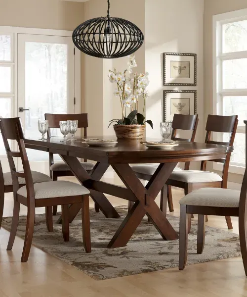 Elegant dining room furniture including tables and chairs