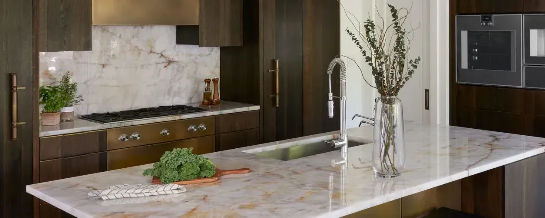 Gaggenau kitchen photo with warm countertops