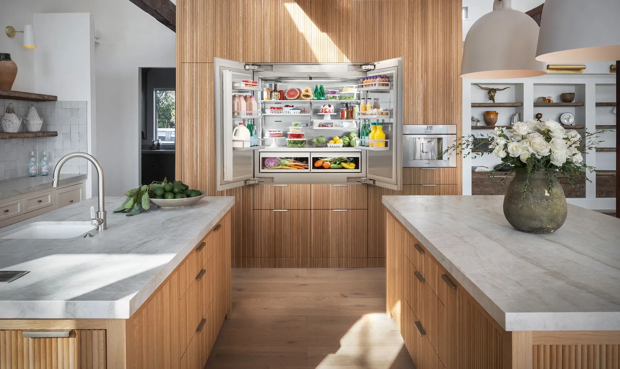 Panel refrigerator in wood toned kitchen photo