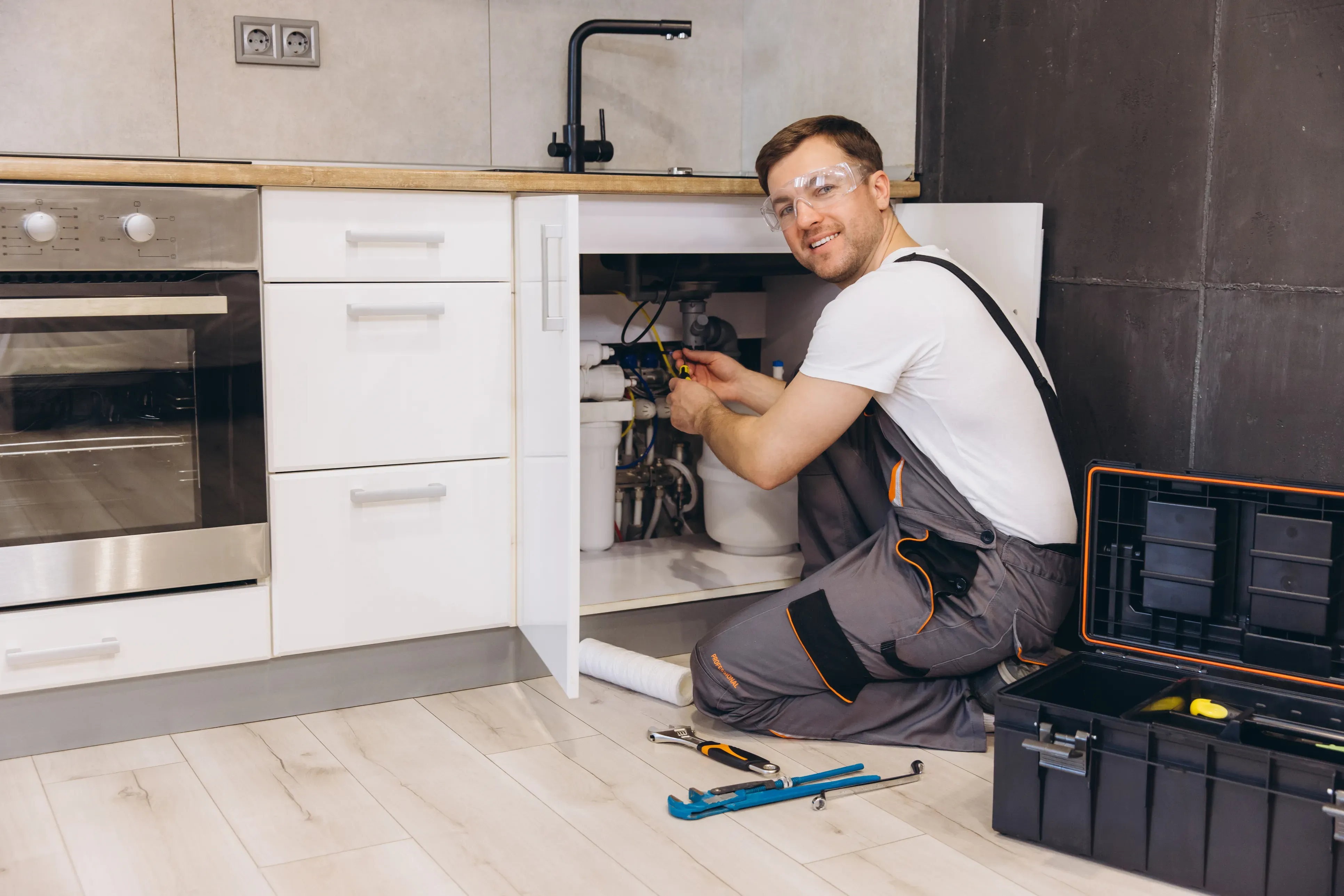 Technician repairing a household appliance