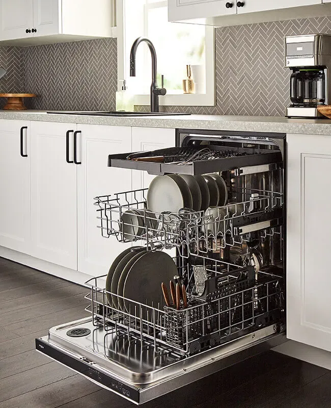 Open dishwasher with clean dishes