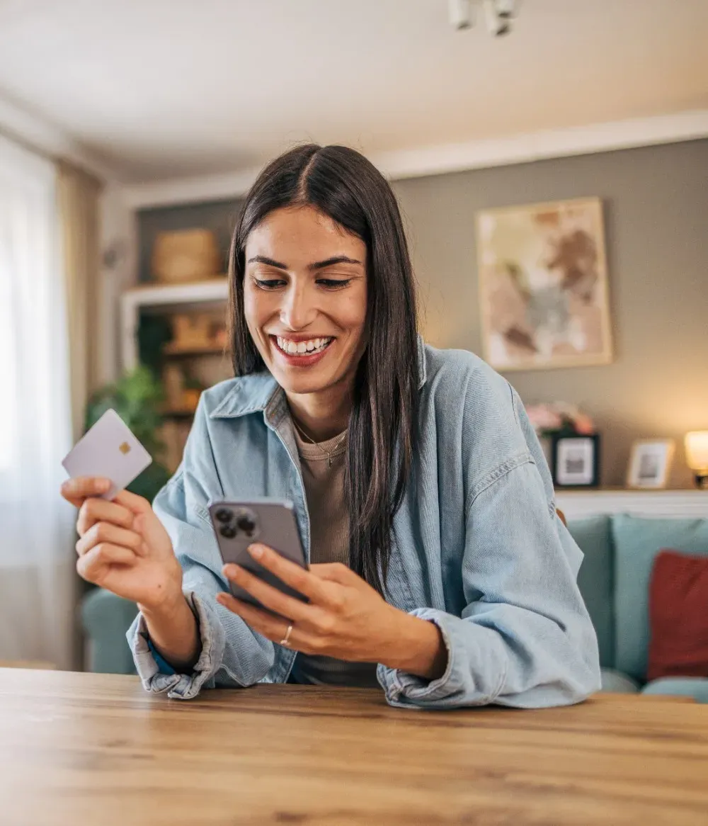 Image of a woman using credit card