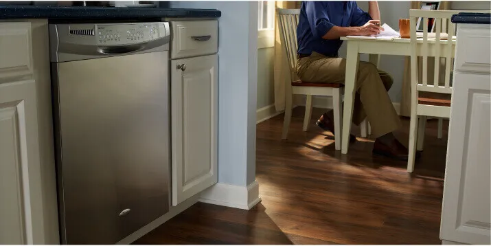 A modern kitchen with a stainless steel built-in dishwasher from Mesa TV & Appliance in Mesa, AZ.
