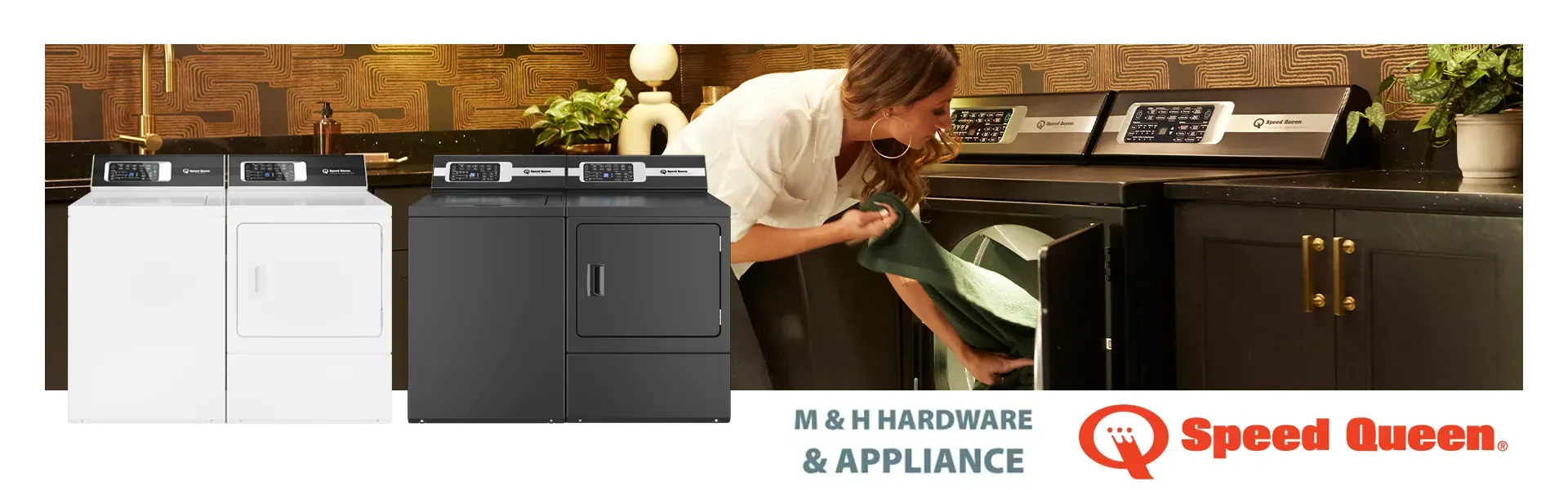 Washer and Dryers in the foreground with Woman doing Laundry in background