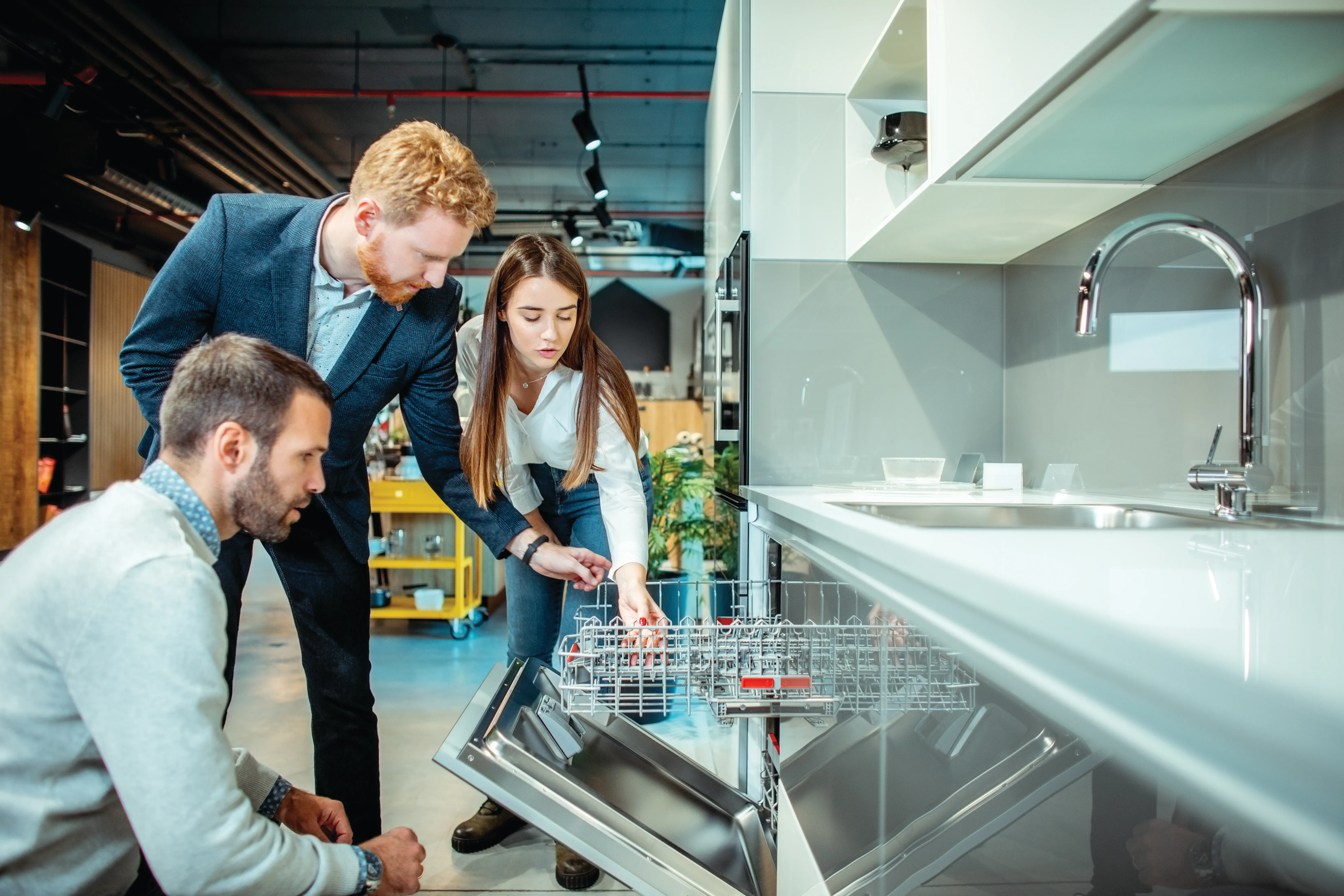 Retailer consulting with customers