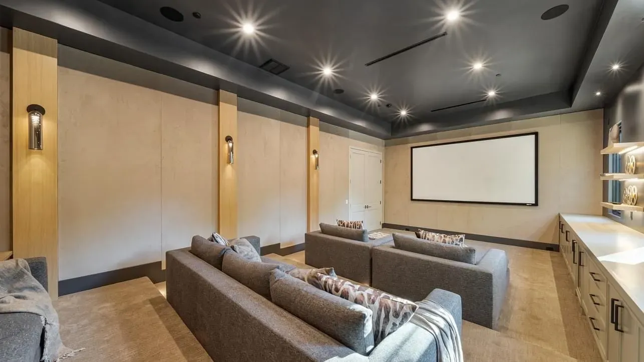 Custom home theater with surround sound and 4K projector