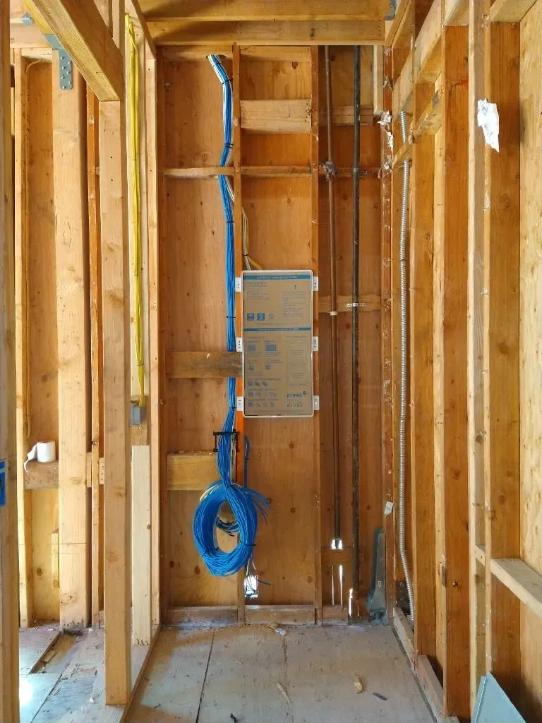 Structured pre-wiring installation during new construction