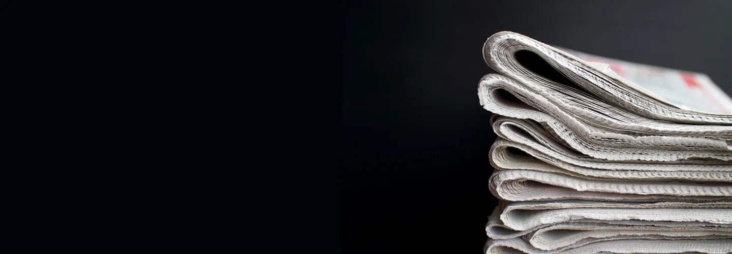 Newspaper showing current promotions