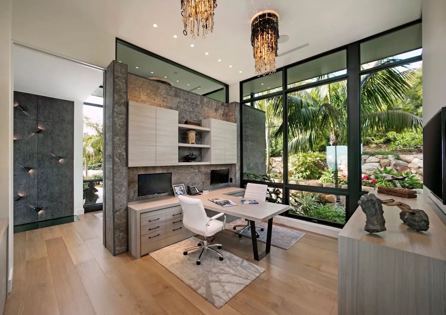 Outdoor patio with weatherproof speakers and display
