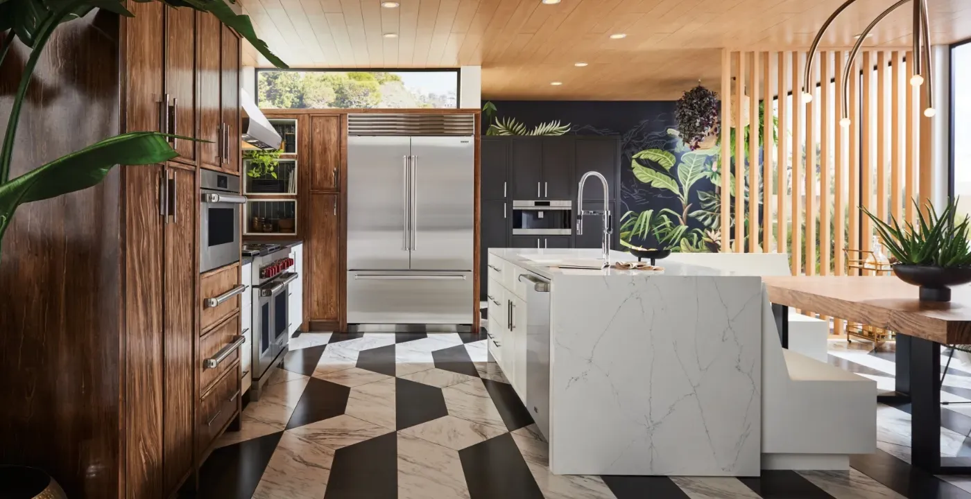 black and white flooring with cabinets and sub-zero appliances
