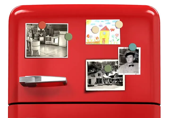 Refrigerator with some pictures attached
