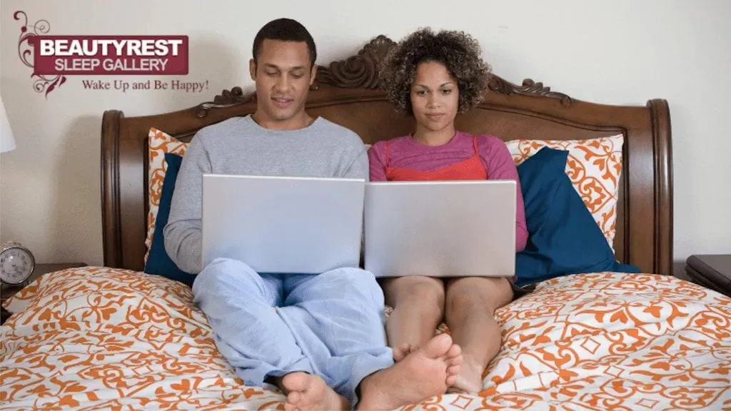 Beautyrest-Sleep-Gallery-couple-sitting-in-bed-1-1024x576-1