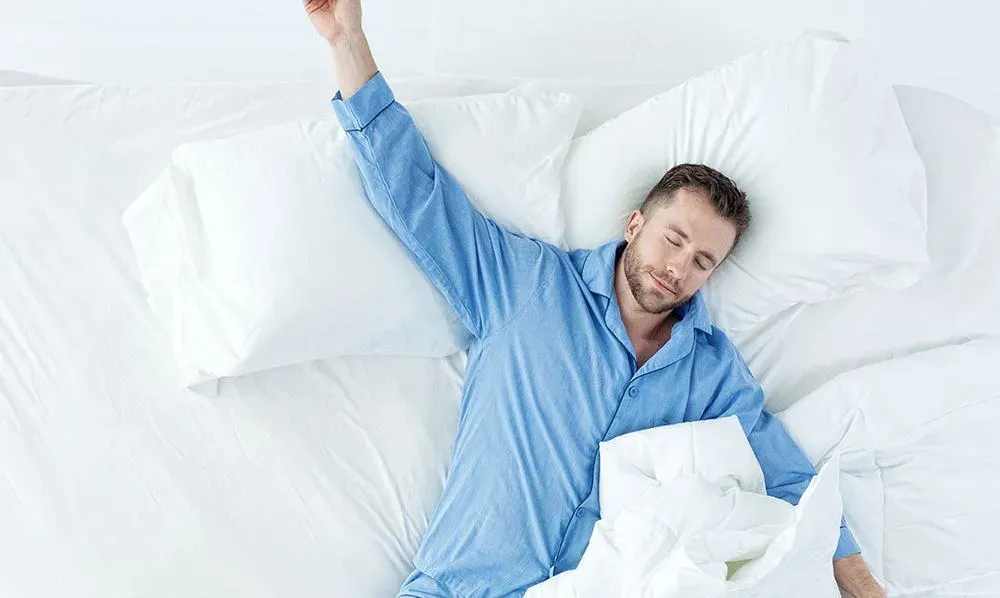 man lying in bed