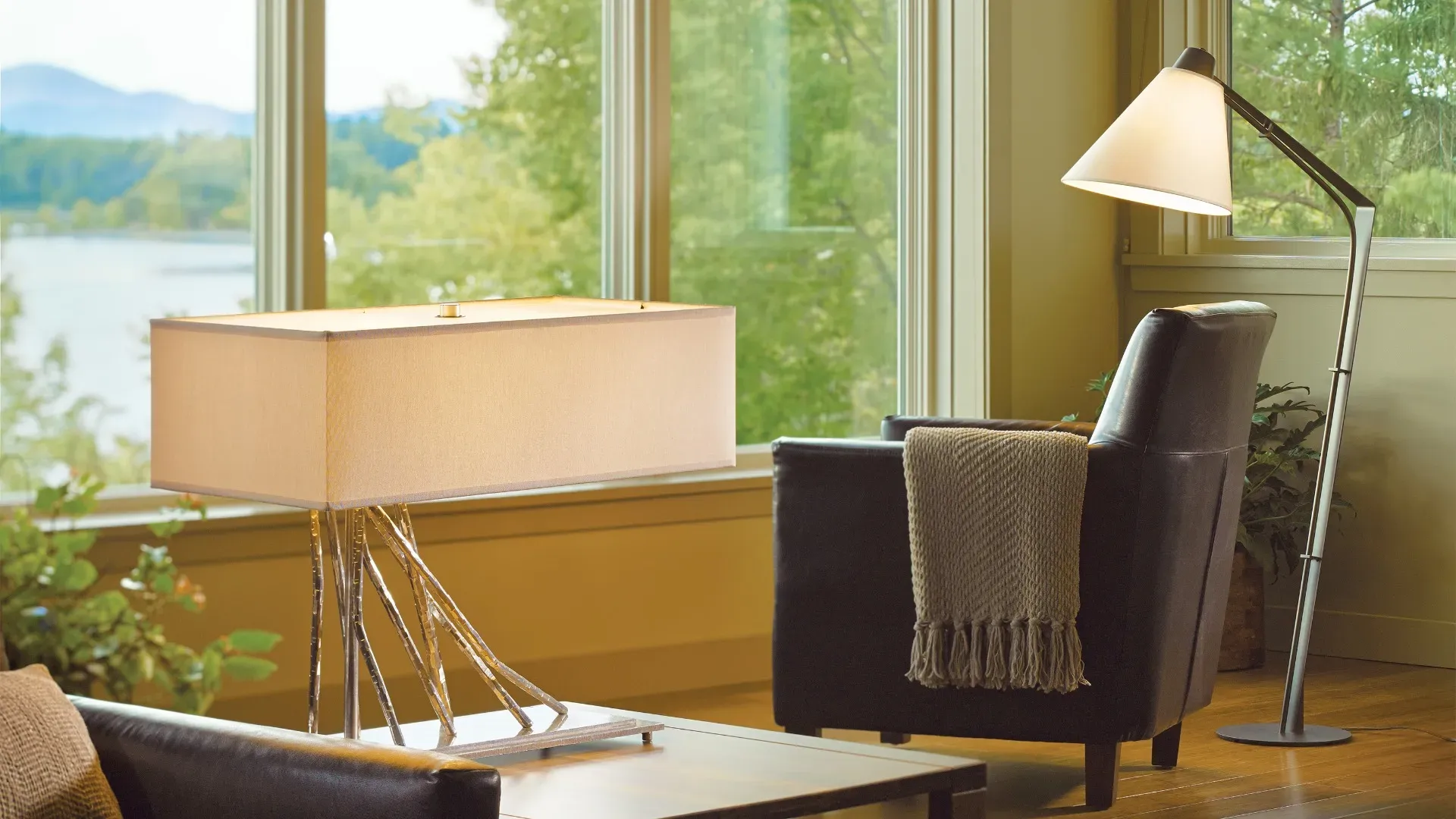 Home accents including decorative lighting and furniture in a modern living space