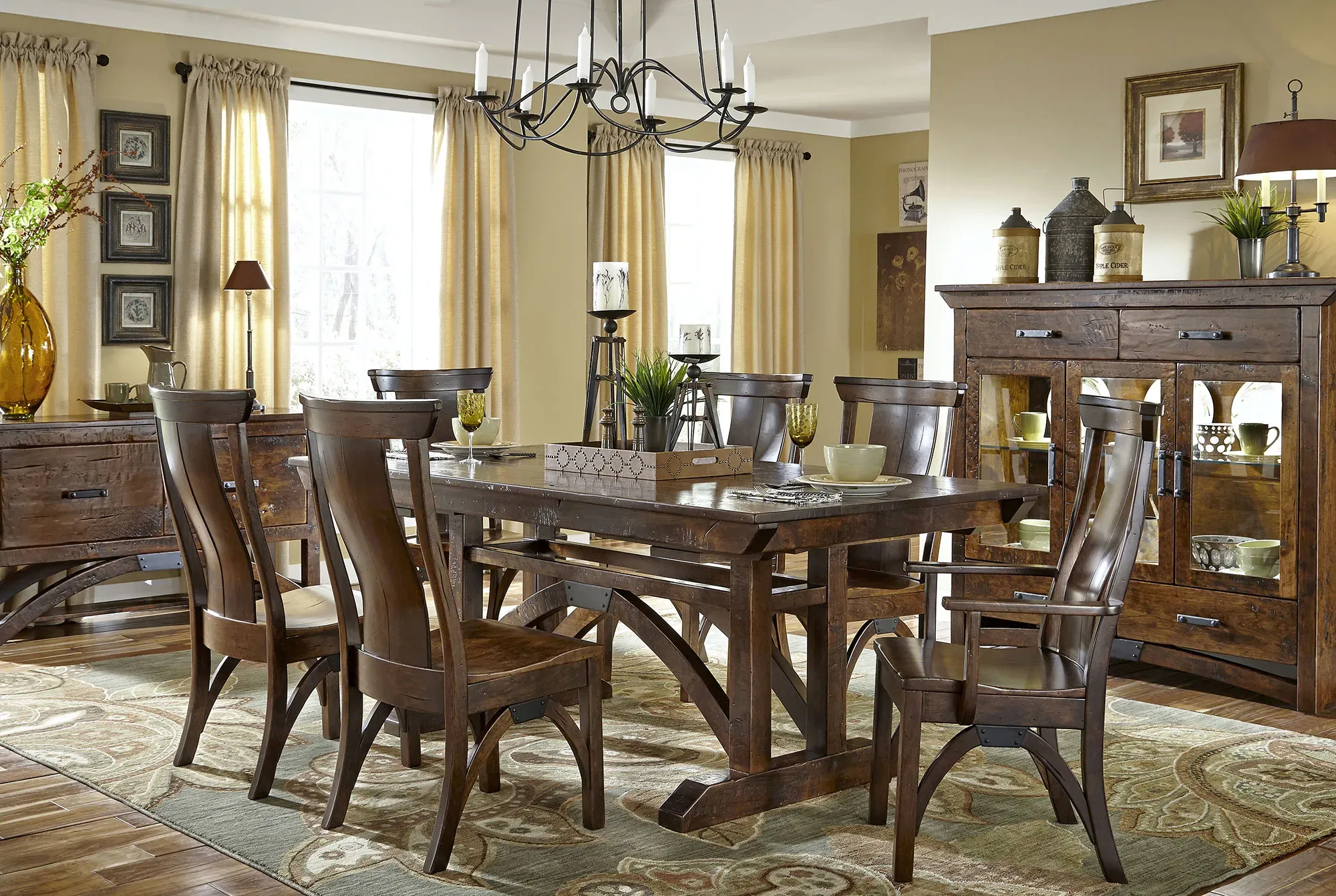 Wood dining room furniture with table and chairs in a warm, elegant interior